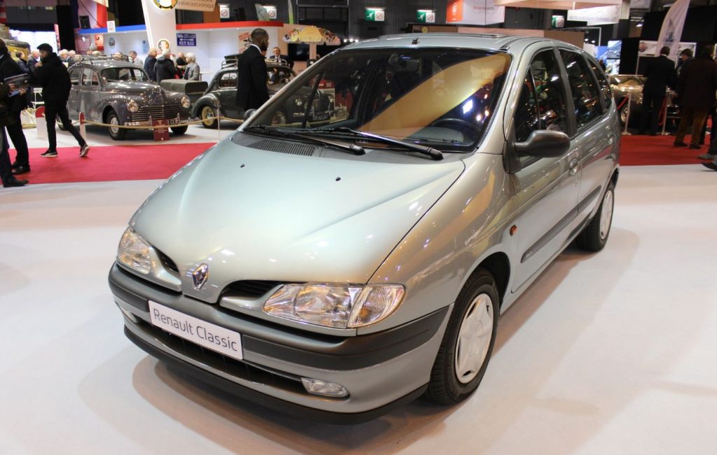 Silver Renault Scenic parked inside a car museum