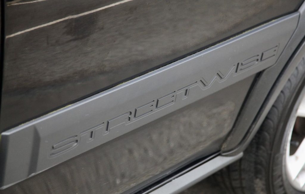Rover Streetwise name badge embossed on grey plastic door sill trim