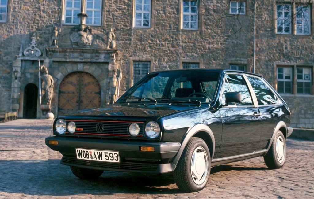 Front view of a parked black Volkswagen Polo G40