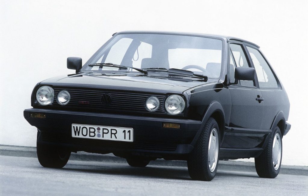 Front view of a parked black Volkswagen Polo G40