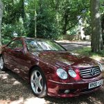 Burgundy Mercedes C63