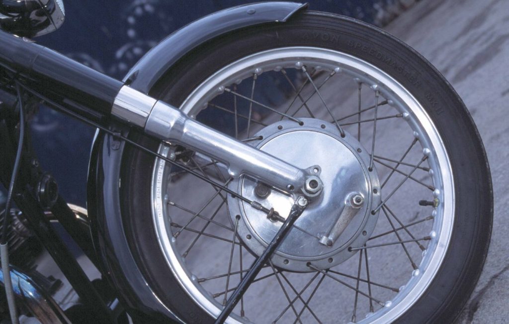 Norton Dominator 88 spoked wheel and drum brake detail, classic British motorcycle running gear