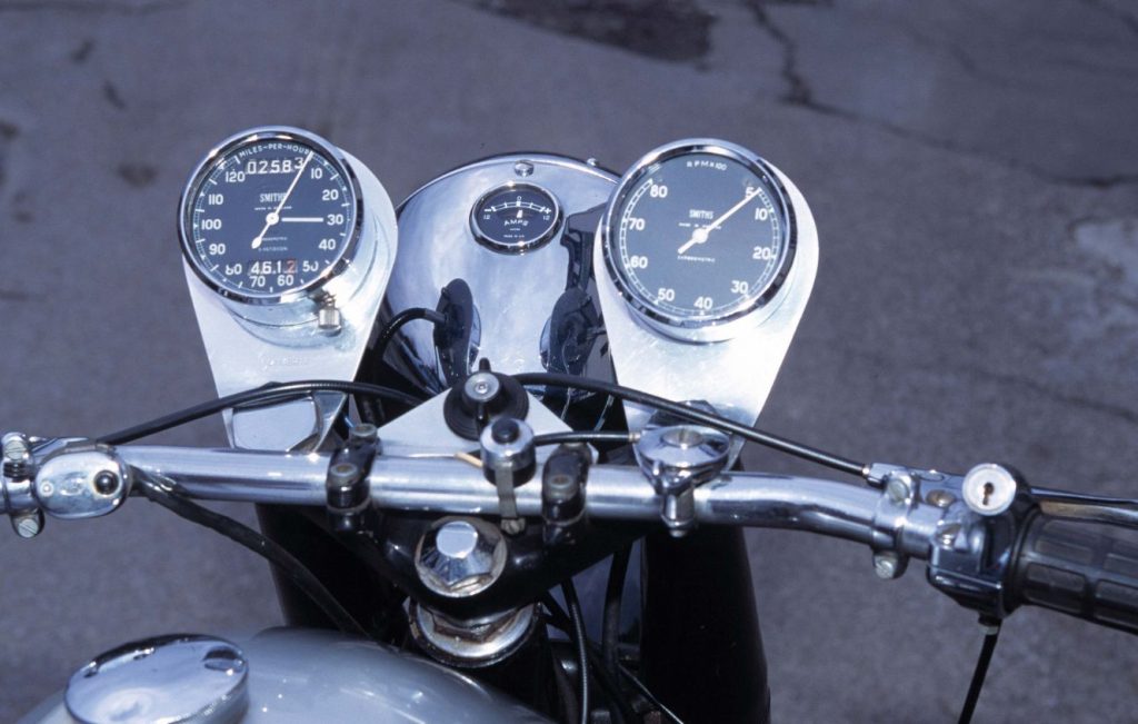 Norton Dominator 88 handlebars and instrument cluster, period-correct speedometer on classic British twin