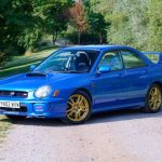 Blue second generation Subaru Impreza parked