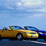 Blue Mercedes-Benz slk 230 kompressor and yellow Mercedes-Benz slk 200
