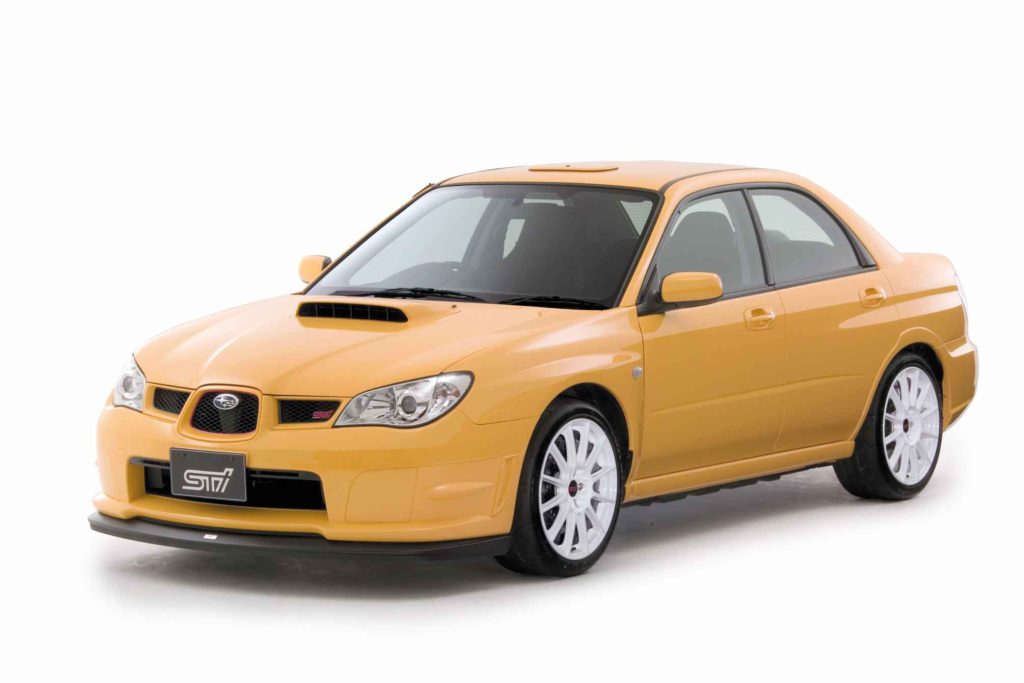 2006 Subaru Impreza WRX STI S204 RA-R Lemon Yellow front three-quarter studio view showing STI aero body kit and white BBS wheels