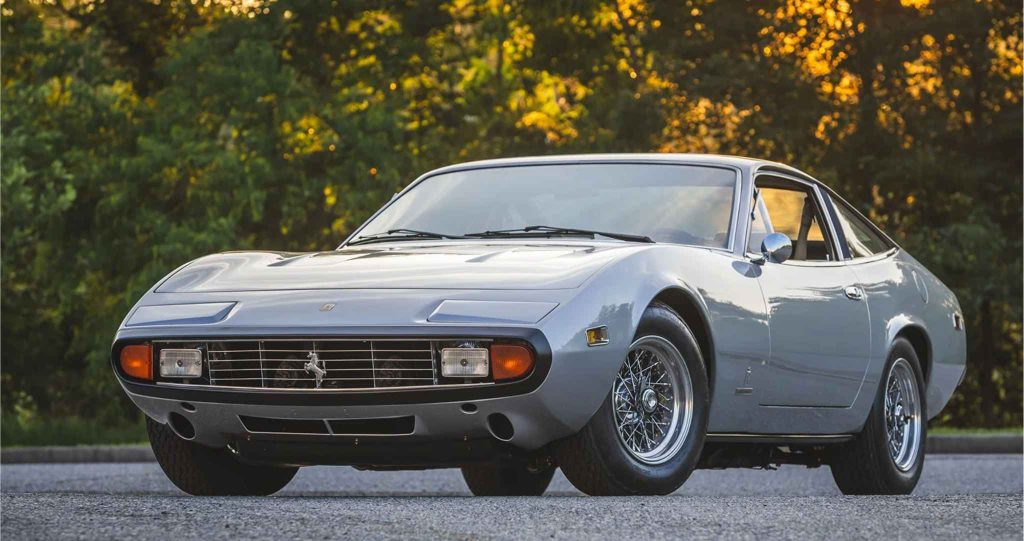 1972 Ferrari 365 GTC/4 in silver, three-quarter front view at dusk