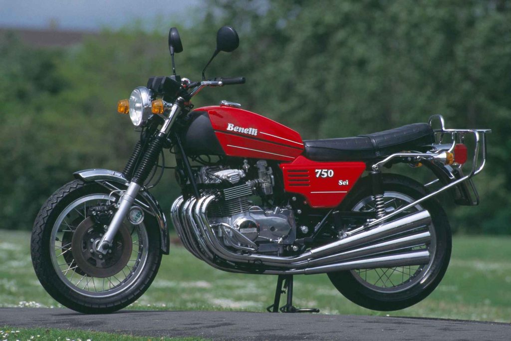Benelli 750 Sei in red, side profile showing the remarkable six-cylinder engine with its bank of six carburettors and six chrome exhaust pipes