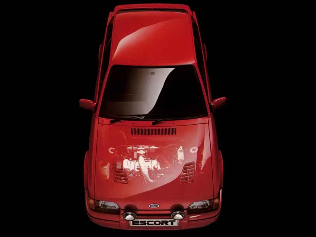 An overhead bird's-eye view of a red Ford Escort RS Turbo against a black background, with a ghosted transparent view of the turbocharged engine visible through the bonnet.