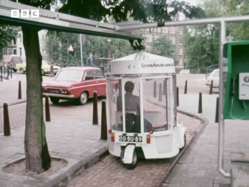 BBC archival footage of a white Amsterdam electric microcar