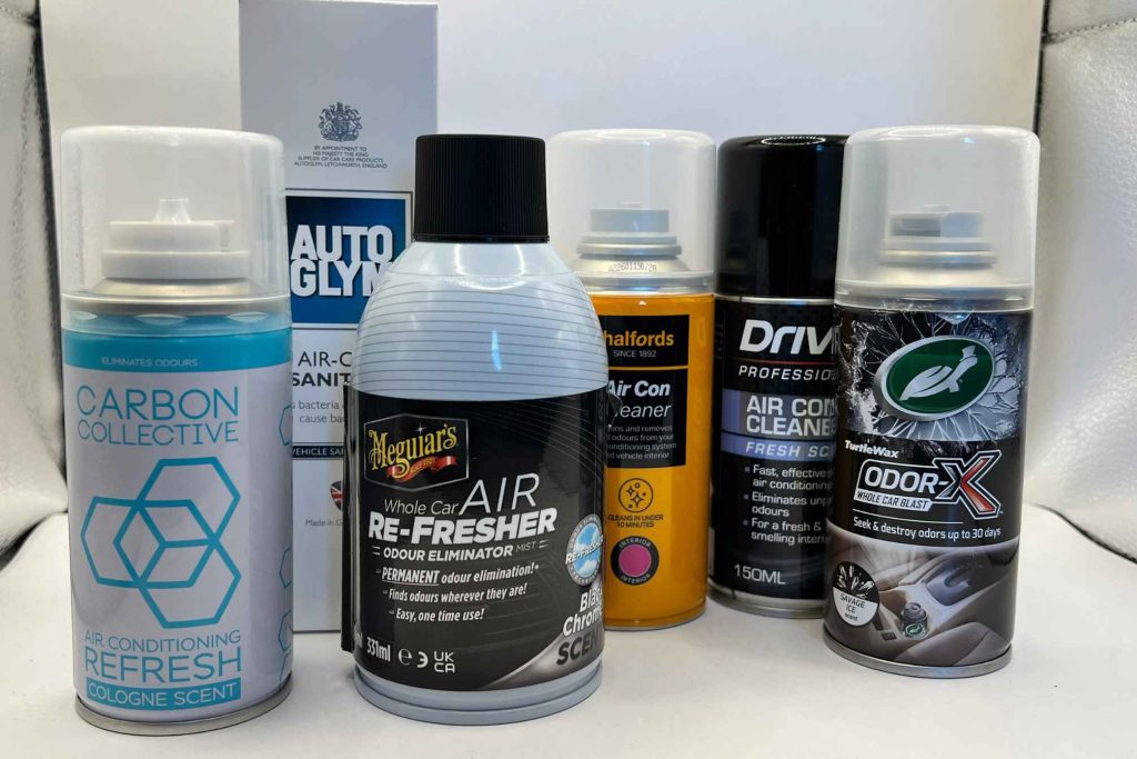 Car odour eliminator spray products including Meguiar's, Autoglym, Turtle Wax Odor-X, Halfords and Drive Professional air con cleaners lined up together