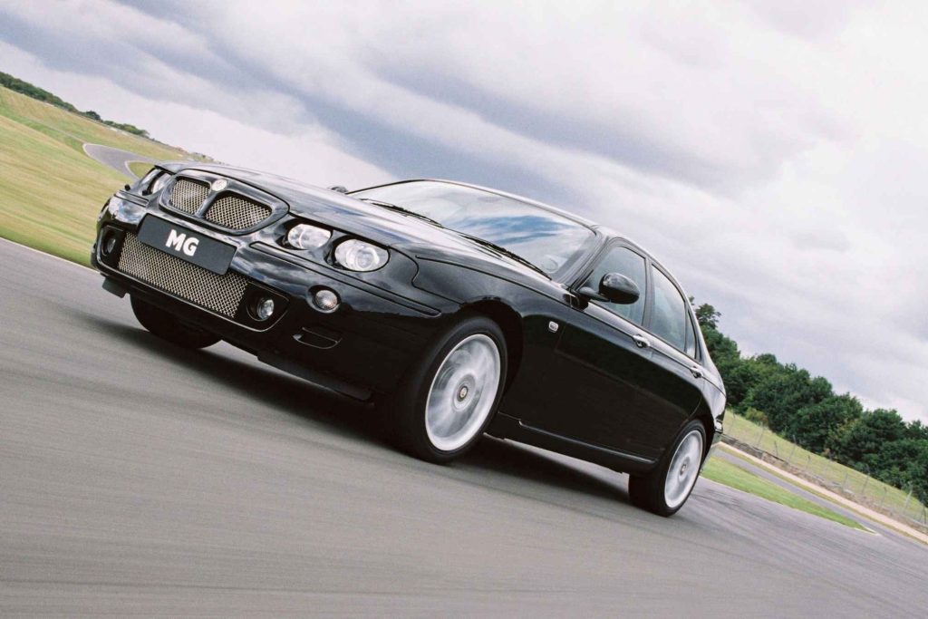 MG ZT saloon in black, front three-quarter action shot on track