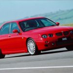MG ZT saloon in red, front three-quarter driving shot on open road