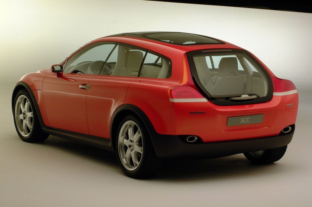 Rear three-quarter view of the red Volvo SCC concept with glass tailgate